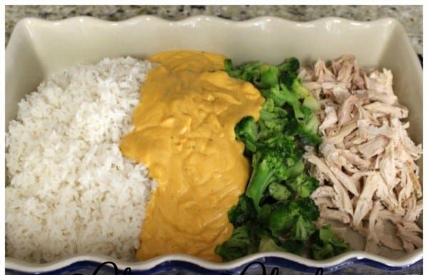 Looking for some easy rotisserie chicken recipes? This Cheesy Chicken, Broccoli & Rice Casserole is so easy to prepare for a weeknight meal. Just shred the chicken, add rice, broccoli and a special sauce and you're good to go. How does it taste? As good as it looks!