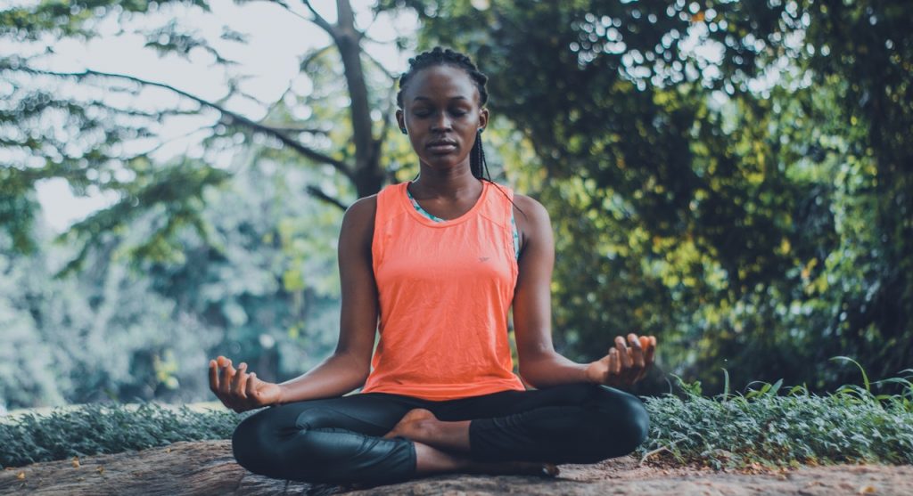 woman meditating 6 apps to destress